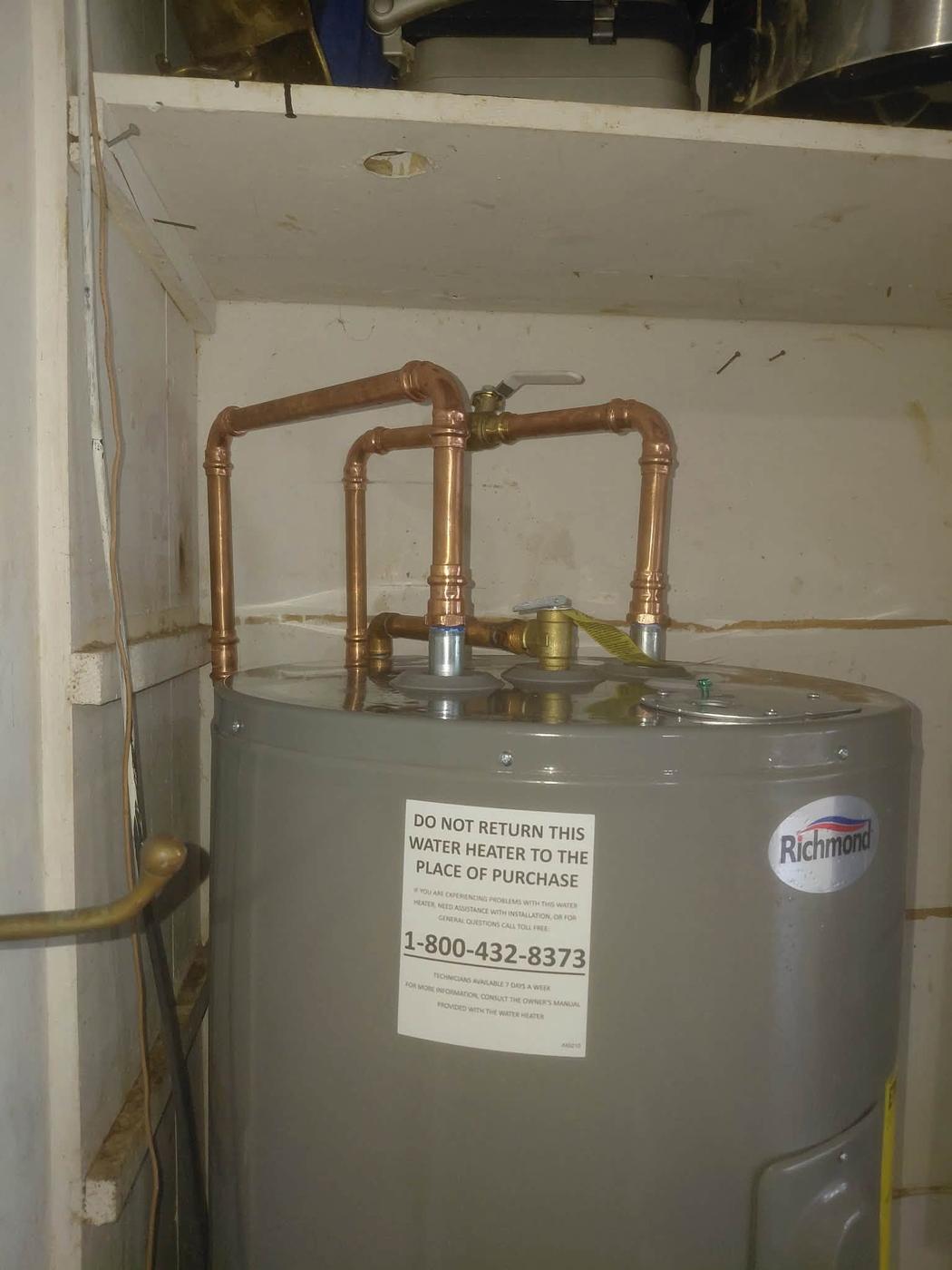 An installed Richmond electric water heater